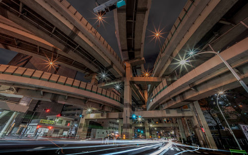 High angle view of light trails on escalator