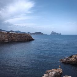 Scenic shot of calm sea against clear sky