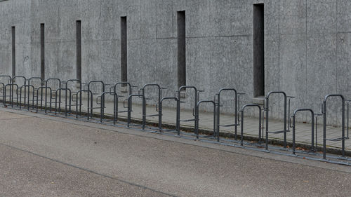 Fence on footpath by street