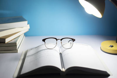 Close-up of eyeglasses on table