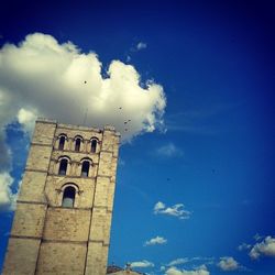 Low angle view of building against blue sky