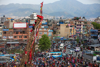 Devotees pull chariots as they take part in the festivities to mark the rato machindranath chariot.