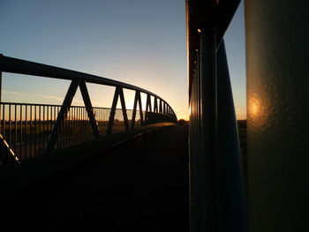 Silhouette of bridge against sky during sunset