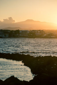 Scenic view of sea against sky during sunset