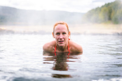 Portrait of woman in hot spring