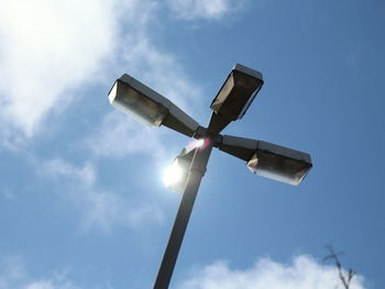 Low angle view of street light against sky