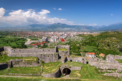 Aerial view of buildings against sky