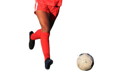 Low section of woman standing against white background