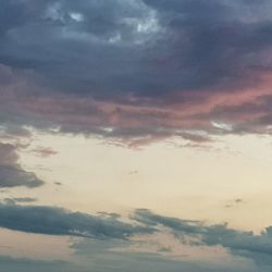 Low angle view of clouds in sky during sunset