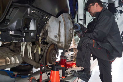 Man working in car