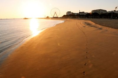 View of beach at sunset