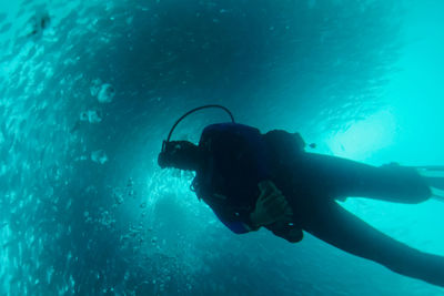 Man swimming in sea