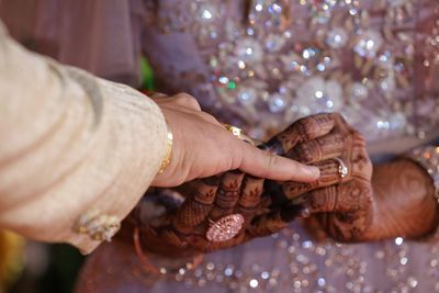 Close-up of woman holding hands