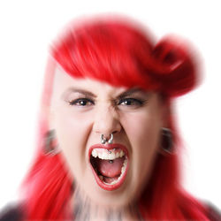 Portrait of angry redhead young woman