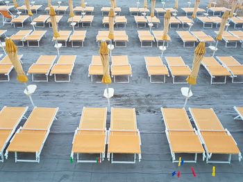 High angle view of chairs in row