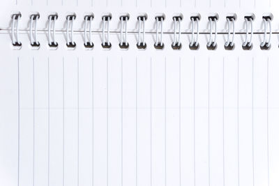 Full frame shot of open blank spiral notebook