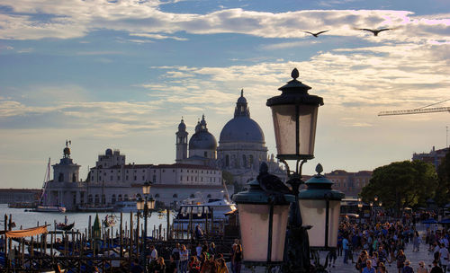 Venice, italy gondola street lights and basilica of st mary of health or santa maria della salute