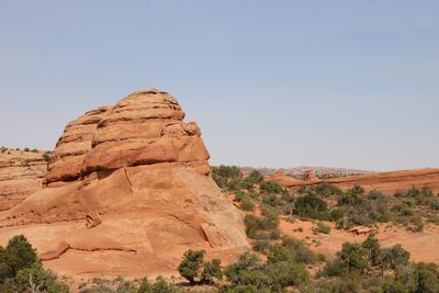 Scenic view of desert against clear sky