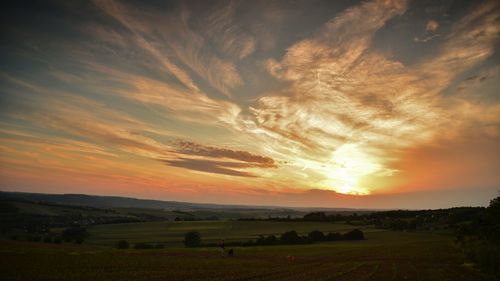 Scenic view of landscape at sunset