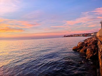 Scenic view of sea against sky during sunset