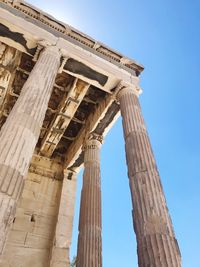 Low angle view of historic building against sky in athens 