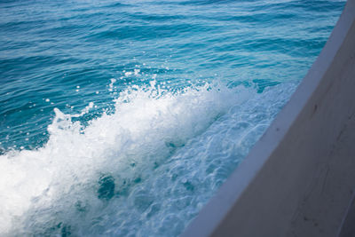 Close-up of wave in sea against sky