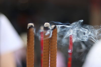 Close-up of burning incense