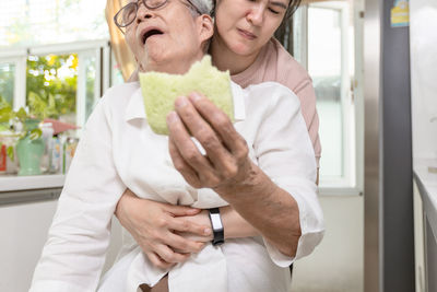 Nurse performing heimlich maneuver