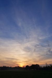Scenic view of silhouette landscape against sky during sunset