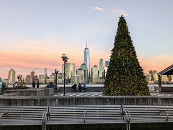 View of downtown manhattan skyline with christmas tree, from jersey city 
