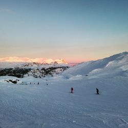 Scenic view of snow covered mountain against sky