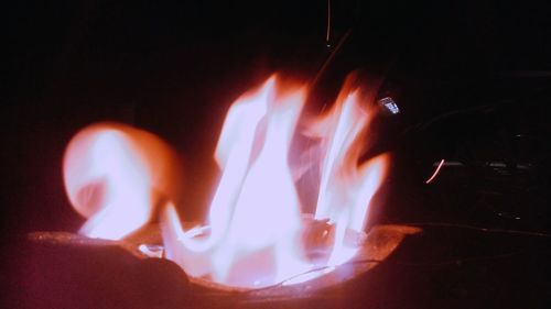 Close-up of burning candle