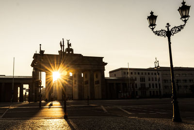 Silhouette of city at sunset