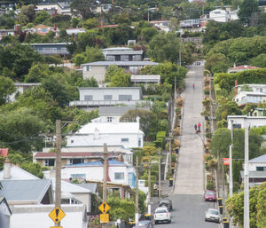 High angle view of street amidst buildings in city