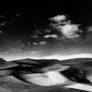 Scenic view of great sand dunes national park against sky during sunset