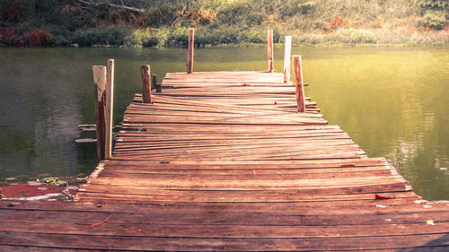 Wooden jetty on pier over lake