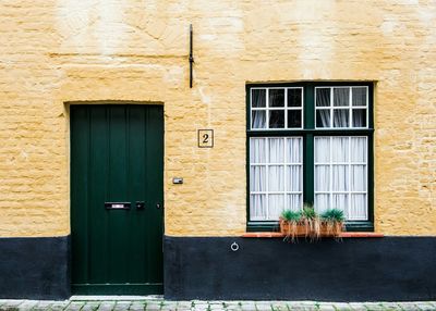 Residential structure with closed window and door