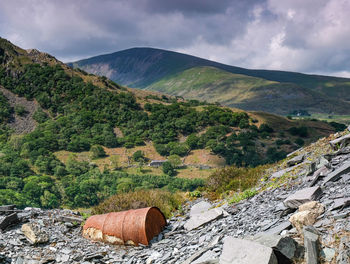 Scenic view of landscape and mountains against sky