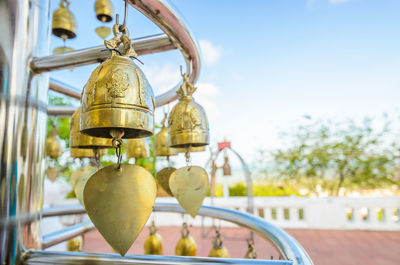 Close-up of bells in temple