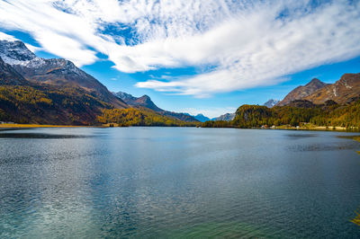 Lake sils maria, in the engadine, photographed in autumn, with landscape and mountains above it.