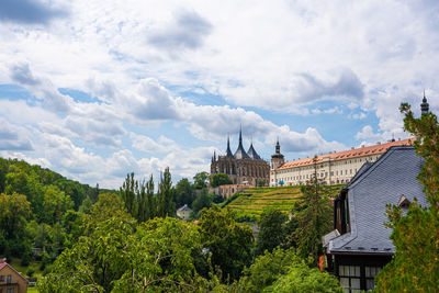 View of castles and trees against sky