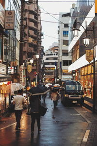 People walking on city street