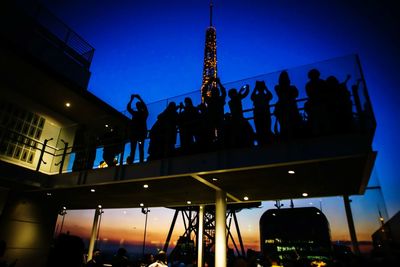 Low angle view of lit up at night