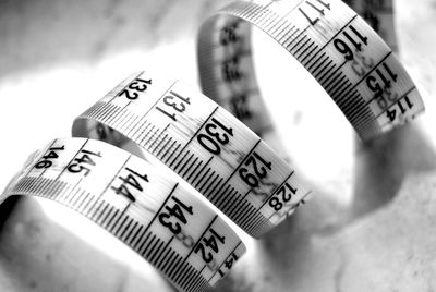 Close-up of information sign on table
