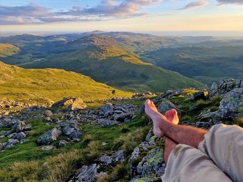 Relaxing up on a mountain barefoot