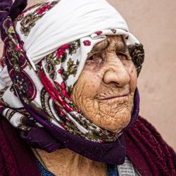 Close-up portrait of woman with ice cream outdoors