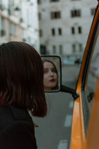 Portrait of woman in car