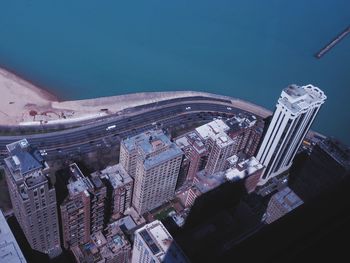 High angle view of buildings in city against sky