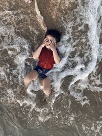 High angle view of kids in sea