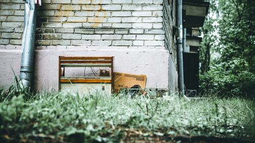 Abandoned building on field